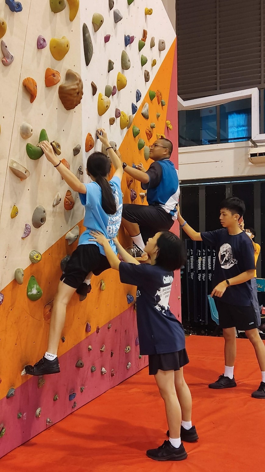 Rock-climbing CCA leaders guided their juniors in Sec 1 Intro to Bouldering programme